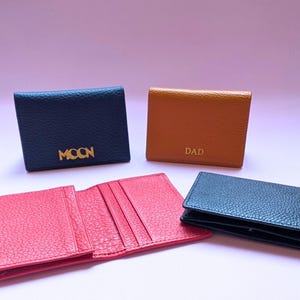 Custom business card holders - red is open so you can see the inside.