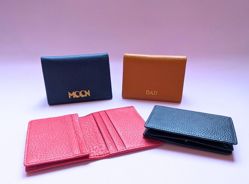 Custom business card holders - red is open so you can see the inside.