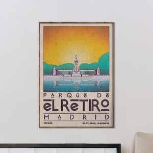 May include: A vintage-style poster with a graphic illustration of the Palacio de Cristal in Parque del Retiro, Madrid, Spain. The poster features a yellow, orange, and green colour scheme with the text "PARQUE DE EL RETIRO MADRID ESPAÑA 40.4172860, -3.6831648".