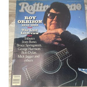 May include: Rolling Stone magazine cover featuring Roy Orbison, 1936-1988, wearing sunglasses and holding a guitar. The cover includes text: "The Last Interview" and mentions tributes from Bono, Bruce Springsteen, George Harrison, Bob Dylan, and Mick Jagger.