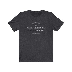 May include: Dark heather grey t-shirt with a white graphic design that says "High Altitude - Bears, Lightning & Hypothermia - What's not to like?"