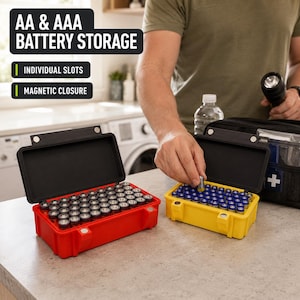 May include: Two rectangular battery storage cases, one red and one yellow, each featuring individual slots for AA and AAA batteries and a magnetic closure. The text AA & AAA BATTERY STORAGE, INDIVIDUAL SLOTS, and MAGNETIC CLOSURE is visible.
