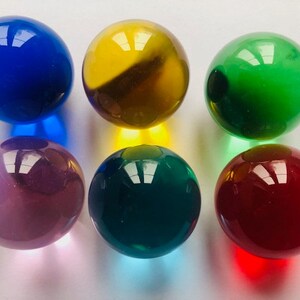 Collection of 6 x 30mm Crystal Cut Clear marbles