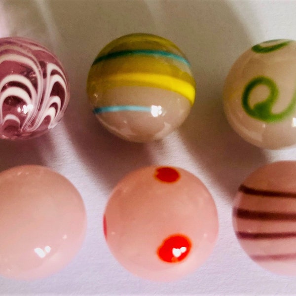 Collection of 6 unusual Pink Hand made Glass Marbles 16mm