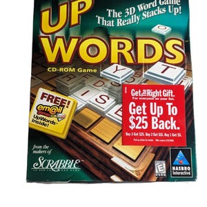 May include: The UpWords CD-ROM board game box features the game title in large yellow letters. The box has a green and brown background with game pieces and the text "The 3D Word Game That Really Stacks Up!" Also includes a "Get Up To $25 Back" promotion.