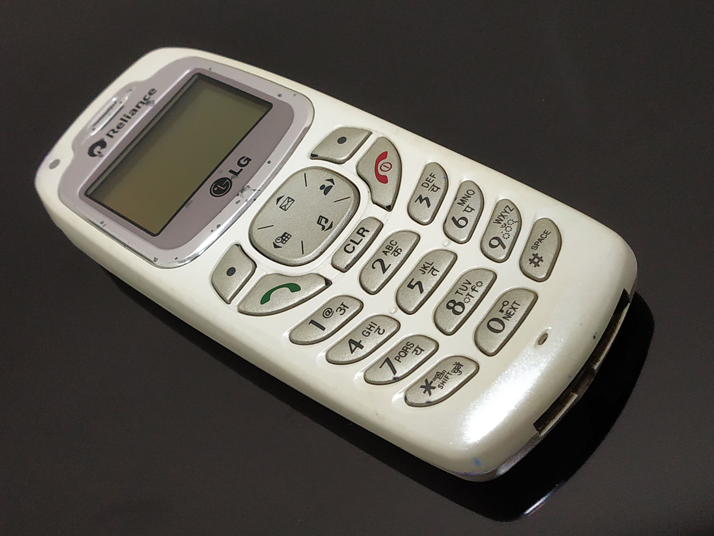 Collectible Reliance LGRD2340 cell phone in Milky White. Old Etsy