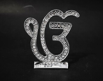 Golden Black Ekonkar religious symbols showpiece statue for home temple, office table Or car dashboard EK Omkar for Car dashboard