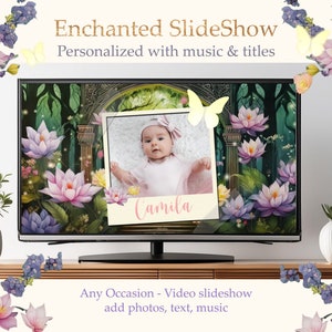 May include: A television screen showing a slideshow with a photo of a baby girl in a pink dress. The background is a whimsical forest scene with flowers and butterflies. The text "Enchanted SlideShow" and "Camila" are visible on the screen.