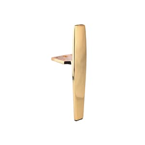 May include: A gold metal furniture leg with a rectangular shape and a flat base. The leg has a smooth, polished finish.