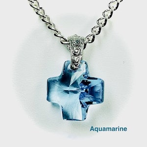Beautiful Puffed Cross with a Swarovski Crystal on a Silver Chain