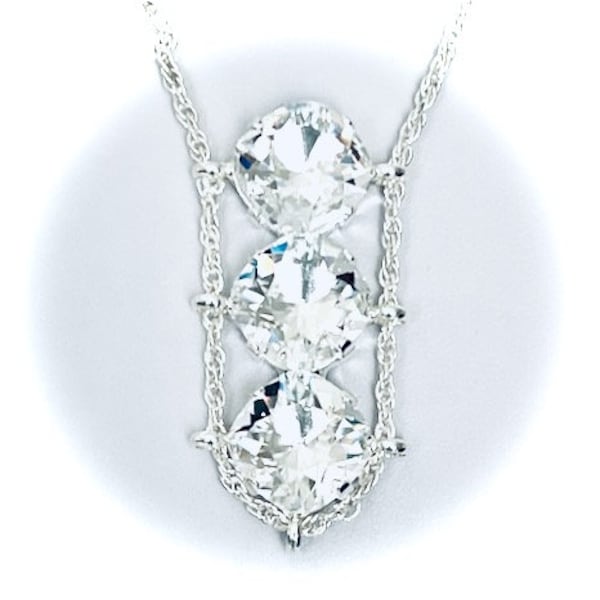 Beautiful Cradle  Necklace with 3 Swarovski Crystals on  a Silver Chain.  Classic!  Trendy!  Lovely!