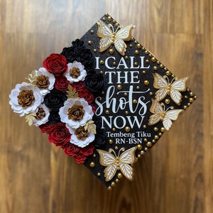 Custom Personalized I Call The Shots Now Teacher Nurse BSN RN Graduation Cap Topper Red Black White Flowers Glitter Butterflies