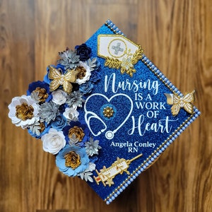 Custom Personalized Heart Stethoscope Nursing Is A Work Of Heart Nurse Graduation Cap Topper Royal Blue Navy Gold Silver Flowers Butterflies