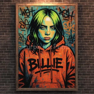 Könnte beinhalten: Gerahmter Kunstdruck mit einem stilisierten Porträt einer Person mit grünen Haaren und einem orangefarbenen Kapuzenpullover. Auf dem Kapuzenpullover steht der Name "BILLIE" in großen schwarzen Buchstaben. Der Hintergrund ist türkis mit Graffiti.