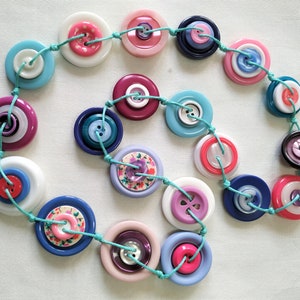 Pink, purple and blue button necklace