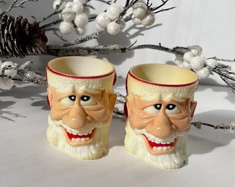 Set of 2 Vintage Miniature Ugly Santa Cups; Scary Christmas Elf Hard Plastic Shot Glasses; Goofy Teeth Santa