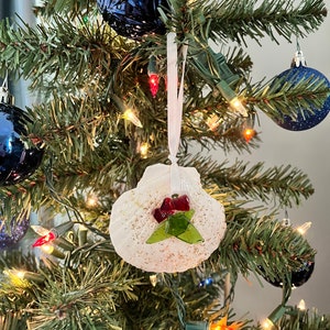 Christmas ornaments handcrafted with a mix of genuine sea glass from the coast of Maine, and recycled red glass.