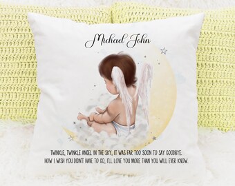 May include: White pillow with a printed image of a baby angel with wings sitting on a crescent moon. The text "Michael John" is printed above the image. The text below the image reads "Twinkle, twinkle angel in the sky, it was far too soon to say goodbye. How I wish you didn't have to go, I'll love you more than you will ever know."