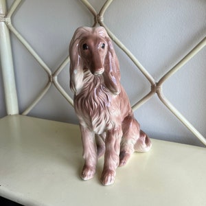Vintage ceramic Afghan dog figurine. dog figurine. shelf decor. vintage dog statue. ceramic Afghan Hound. Sitting dog figurine