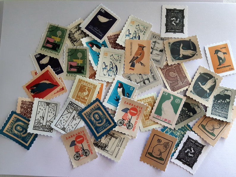 May include: A collection of vintage postage stamps featuring various designs, including birds, animals, and geometric patterns. The stamps are in different colors and sizes, and some have text in Cyrillic and other languages.