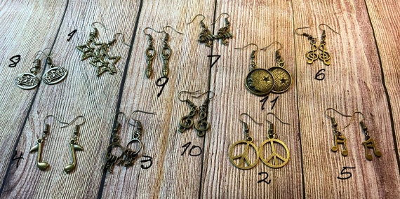 Old Bronze Earrings Pair, Moon, Stars, and Sun, Music, Dragons, Keys, and Goddess Patterns. 11 designs, handmade, in a velvet bag