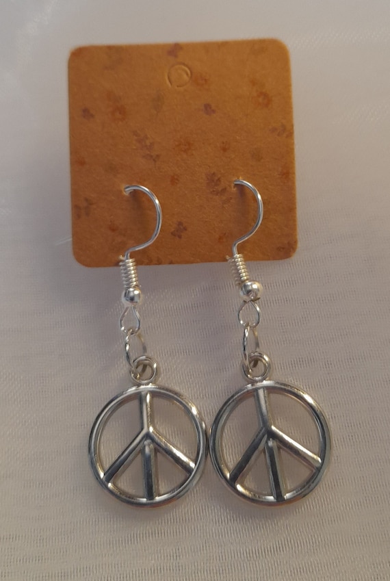 Silver Colour Earrings, 4 Styles to choose from (Peace, Moon, Dolphins or Holiday) in velvet bag. Hand Made
