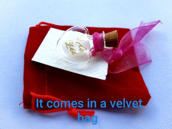 Glass vials with message inside, personalized tag, romantic message in a bottle. Romantic gift.