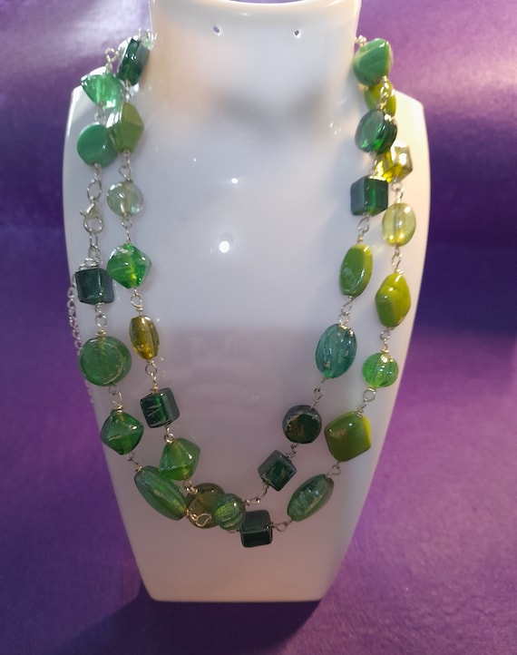 Necklace or earrings or bracelet. Green Glass beads and silver colour wire. Long-size, assorted pattern beads. Hand Made.