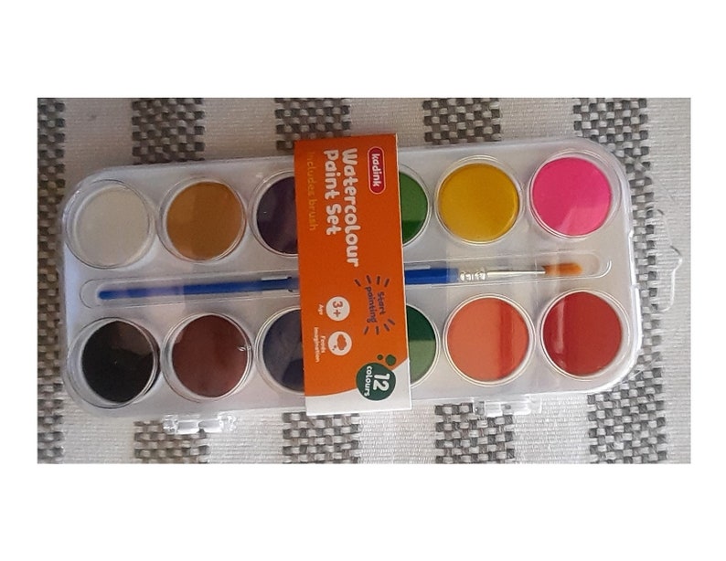 May include: A watercolor paint set with 12 colors in a plastic case. The set includes a brush and is labeled "Watercolour Paint Set" and "12 colours".