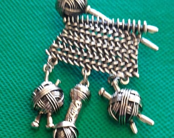 I love knitting brooches, and original designs, for knitting lovers, Silver brooch, Golden Brooch, and Copper Brooch. In a gift bag.