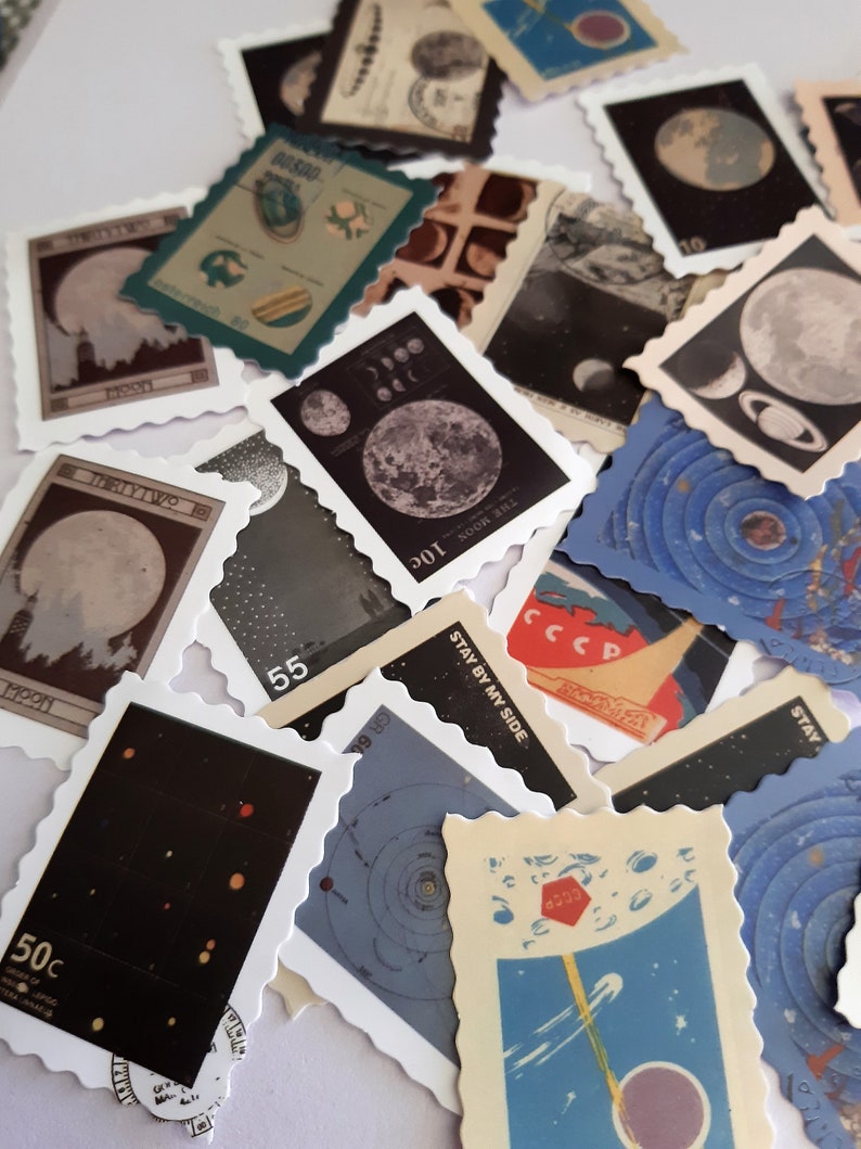 May include: A collection of vintage space-themed stamps featuring images of the moon, planets, and stars. The stamps are printed on white paper with a scalloped edge and have various colors, including blue, red, green, and black.