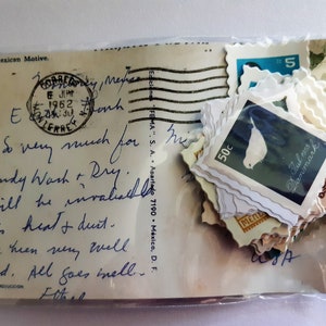 May include: A vintage postcard with a handwritten message and a collection of stamps featuring a bird, a 50c denomination, and the text "Jul s Danmark".