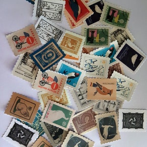 May include: A collection of vintage postage stamps featuring various designs, including birds, animals, and landscapes. The stamps are in different colors and sizes, and some have text in foreign languages.