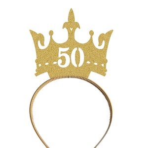 May include: Gold glitter crown headband with the number 50 in white.