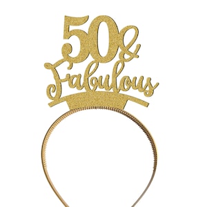May include: Gold glitter headband with the text "50 & Fabulous" on it.