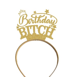 May include: Gold glitter headband with the text "Birthday Bitch" and a crown on top.