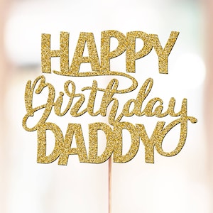 May include: Gold glitter cake topper with the text "Happy Birthday Daddy" in a cursive font.