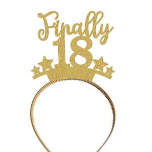May include: Gold glitter headband with the words "Finally 18" and stars.