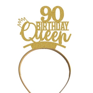 May include: Gold glitter headband with a crown and the text "90 Birthday Queen".