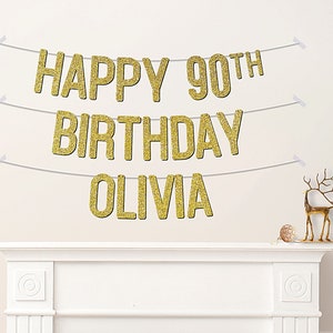 May include: Gold glitter banner with the text "Happy 90th Birthday Olivia".