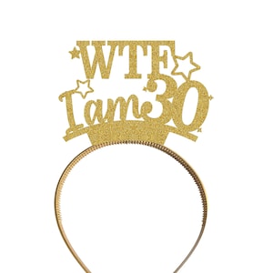 May include: Gold glitter headband with the text "WTF I am 30" and two stars.