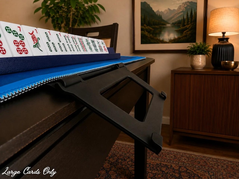 Black foldable 3D printed PLA hands-free mahjong card holder, slim compact footprint ideal for small card tables and tight game setups.