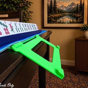Neon Green foldable 3D printed PLA hands-free mahjong card holder, slim compact footprint ideal for small card tables and tight game setups.