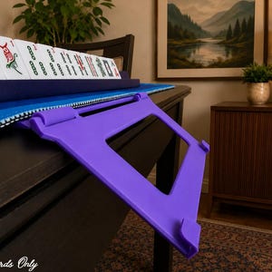 Lilac foldable 3D printed PLA hands-free mahjong card holder, slim compact footprint ideal for small card tables and tight game setups.