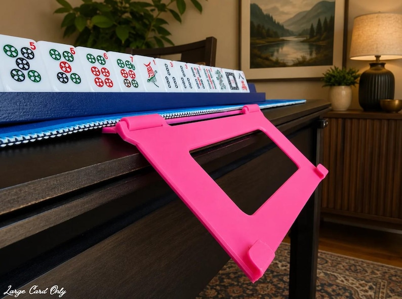 Hot Pink foldable 3D printed PLA hands-free mahjong card holder, slim compact footprint ideal for small card tables and tight game setups.
