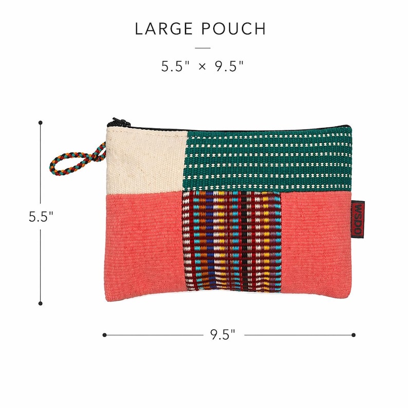 May include: A rectangular large pouch with a patchwork design. The pouch is 14 cm high and 24 cm wide. It features a color block design with sections of cream, coral, green, and a patterned section with red, yellow, and blue. The pouch has a black zipper and a small wrist loop.
