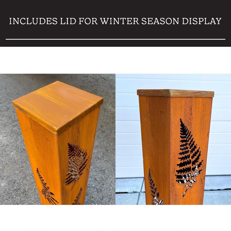 May include: Rust-colored metal planter with a fern leaf cut-out design. The planter has a square top and a matching lid. The text "INCLUDES LID FOR WINTER SEASON DISPLAY" is at the top of the image.