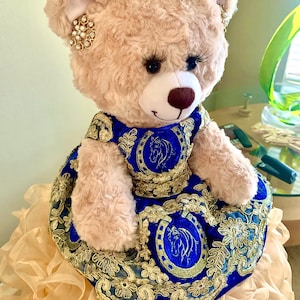 Quinceanera Princess Bear/Doll with custom made blue and gold dress with ruffled skirt, and  embroidered charro horseshoe and lace trim.
