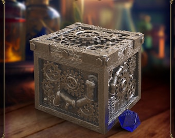 May include: A brown wooden box with a steampunk design, featuring gears and pipes. The box has metallic accents and a blue, multi-sided die. The top is covered in gears. The text "Tiny Towers Fates End" is visible on the box.