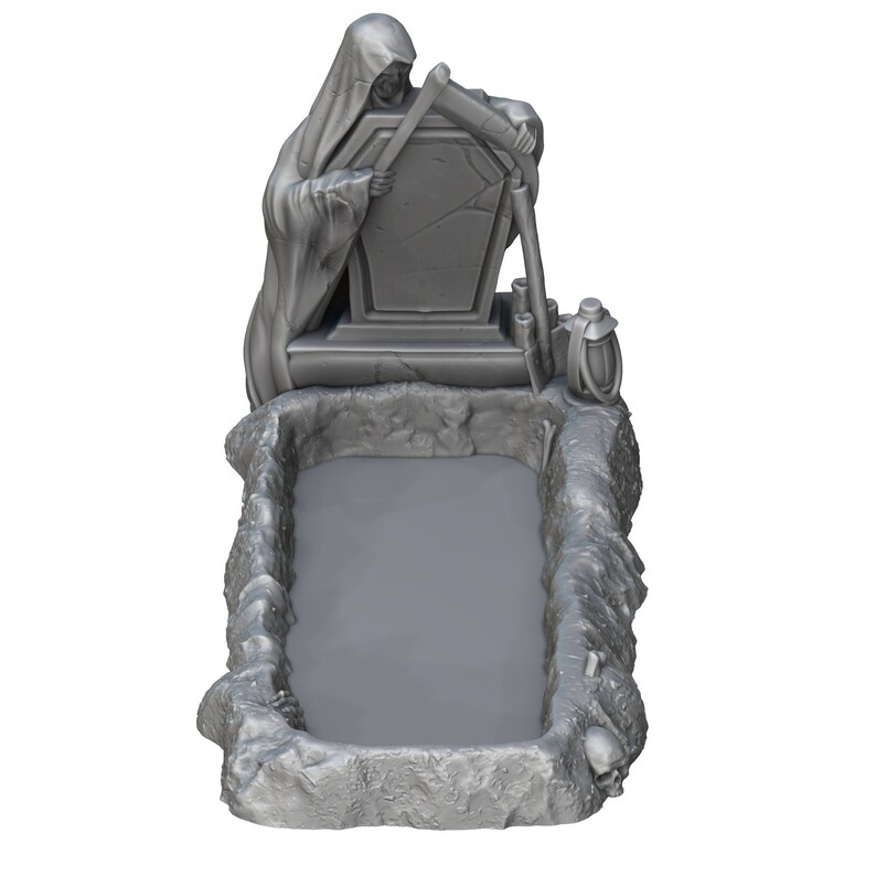 May include: A gray miniature graveyard scene featuring a grim reaper figure leaning on a tombstone. The scene includes a grave, a lantern, and a skull, all in a detailed, gothic style. Ideal for tabletop gaming or as a unique decorative piece.
